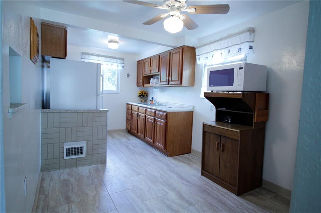 401 Pearce Road Pittsburgh, PA 15234 - Photo 4 of 20 Spacious, bright, eat-in kitchen just has had new flooring installed!