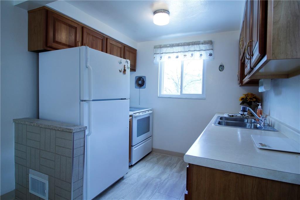 401 Pearce Road Pittsburgh, PA 15234 - Photo 6 of 20 Plenty of counter space for meal prep and lots of cabinets too