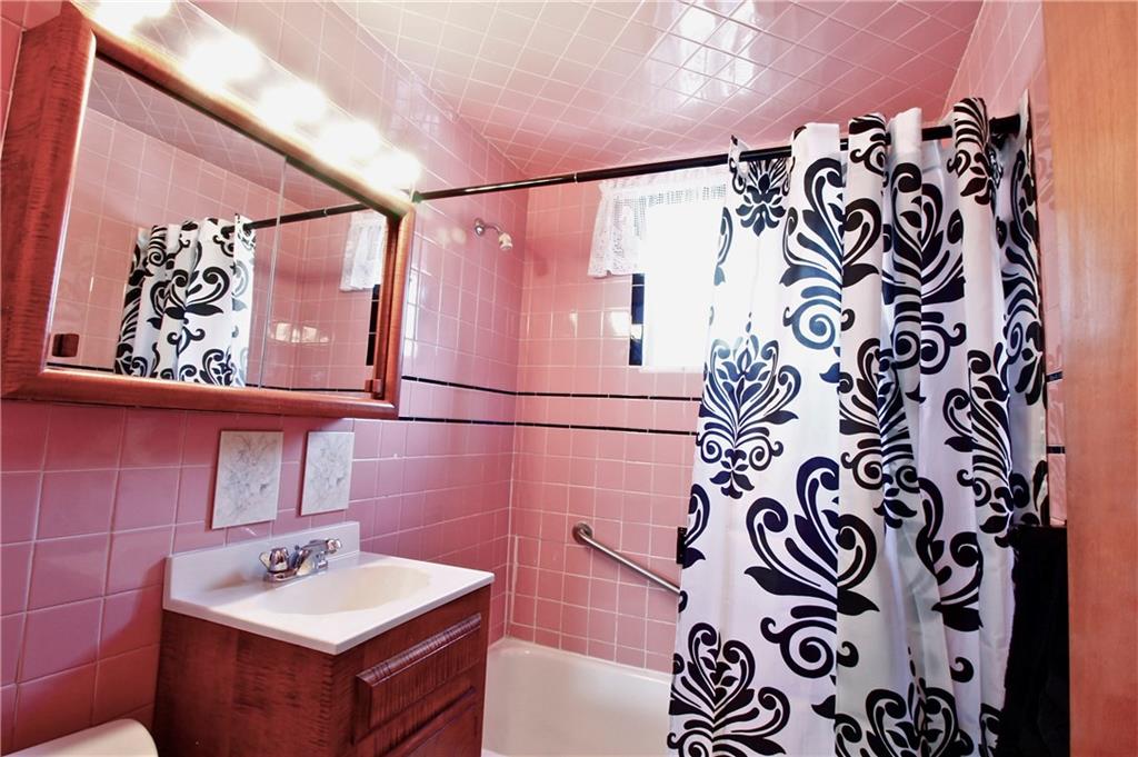 401 Pearce Road Pittsburgh, PA 15234 - Photo 10 of 20 Bathroom is charming with vintage tile ~ it really does look this beautiful & well maintained