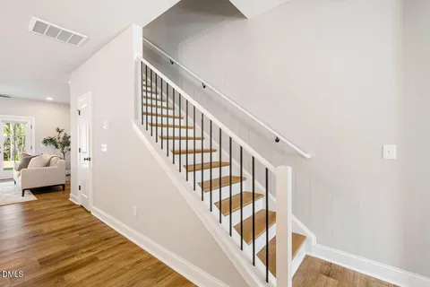 a view of entryway with wooden floor