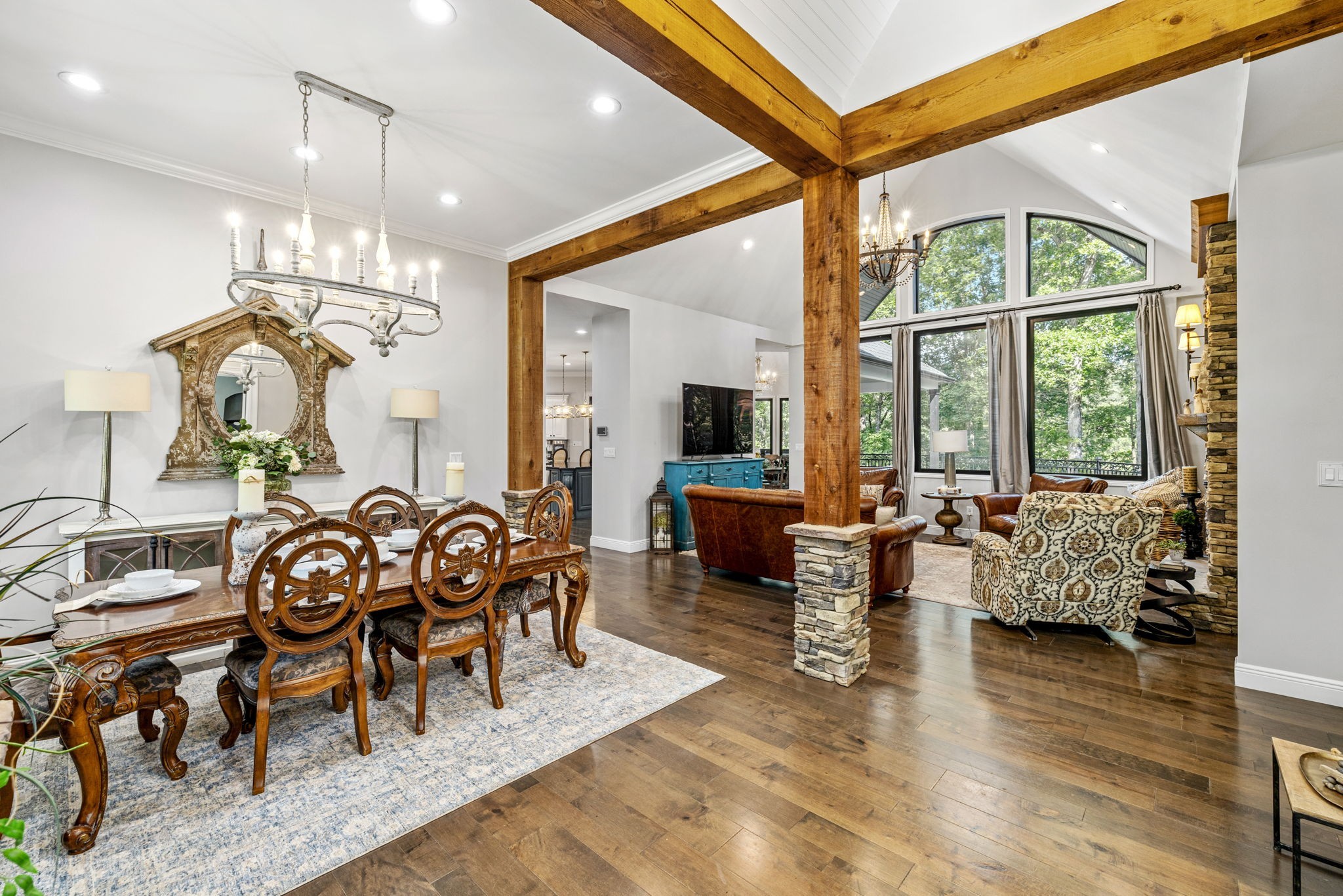 74 Pine Lake Road Summertown, TN 38483 - Photo 20 of 90 a view of a dining room and livingroom with furniture wooden floor a chandelier