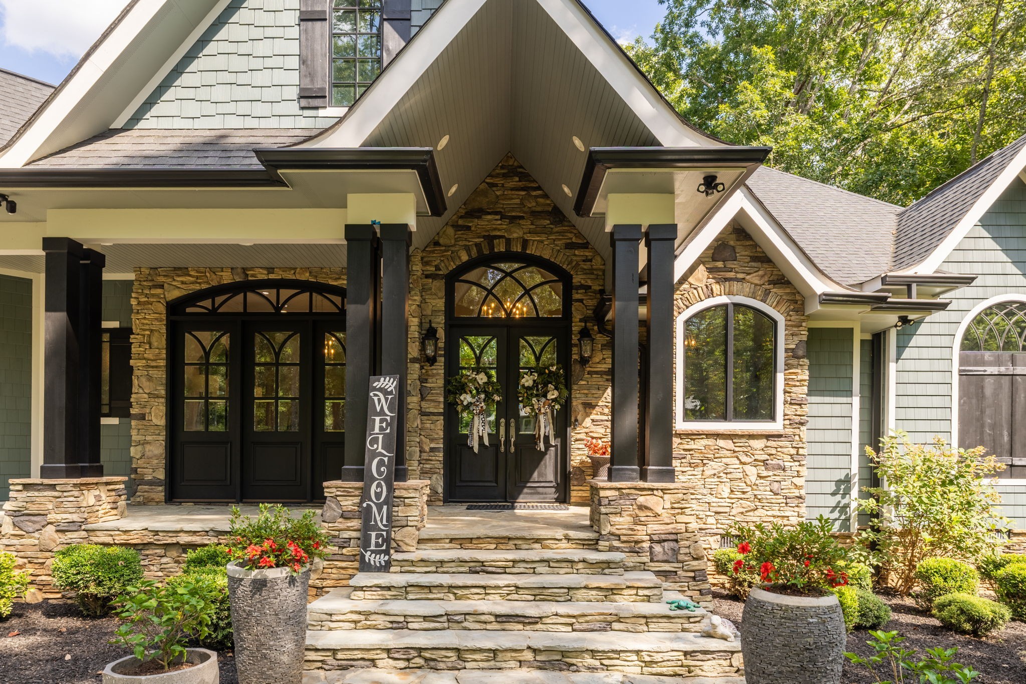 74 Pine Lake Road Summertown, TN 38483 - Photo 8 of 90 a front view of a house with garden