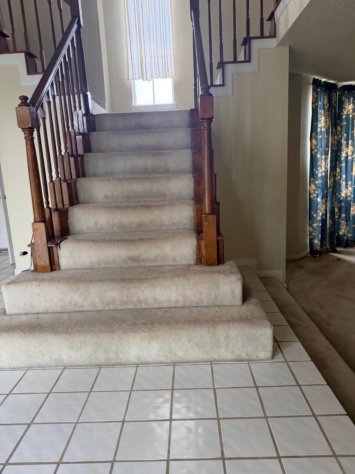 14702 Rancho Vista Drive Houston, TX 77083 - Photo 11 of 11 Carpeted staircase with wooden railings.