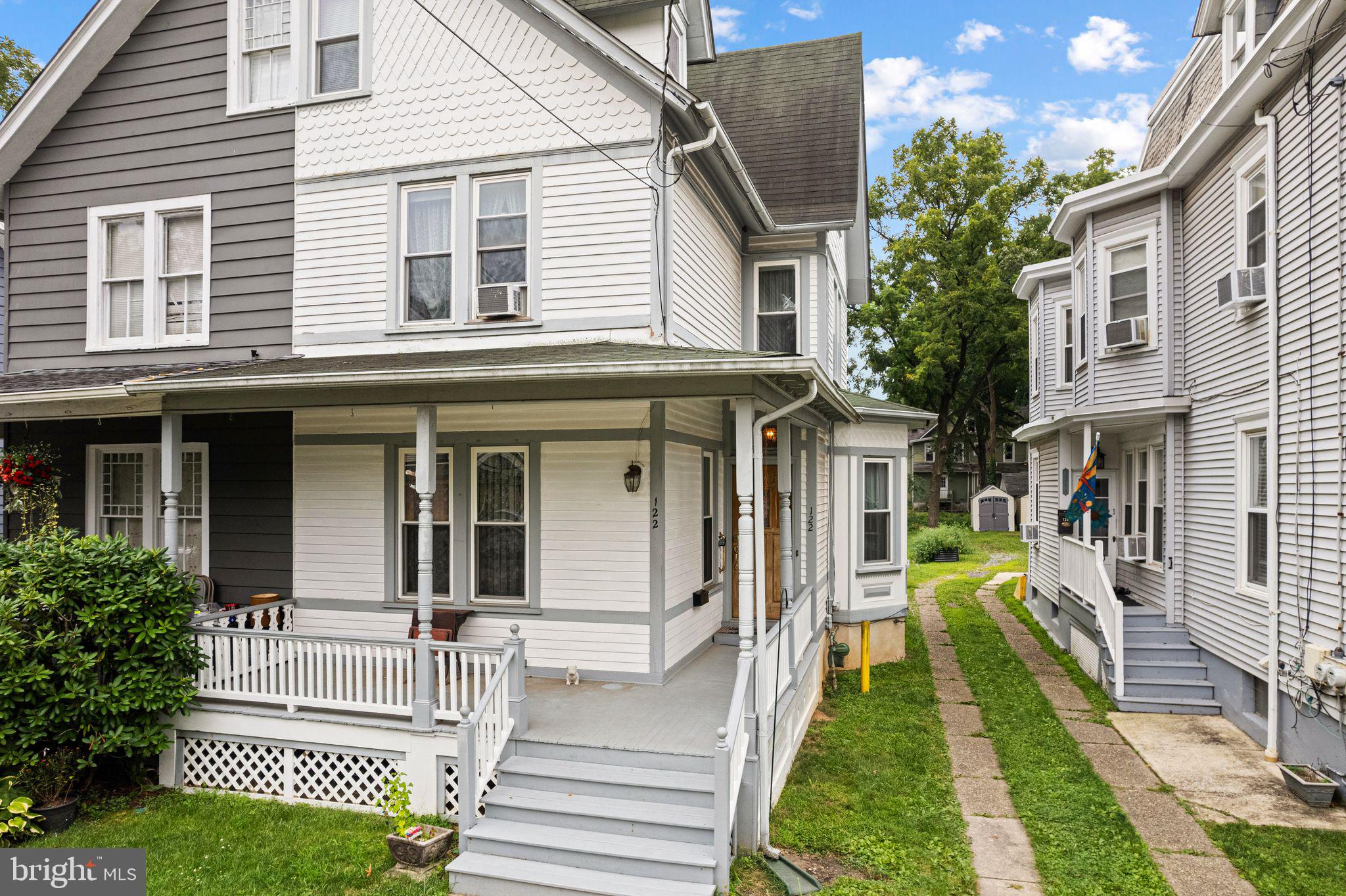 122 West Cottage Avenue Haddonfield, NJ 08033 - Photo 2 of 23 a front view of a house with a yard