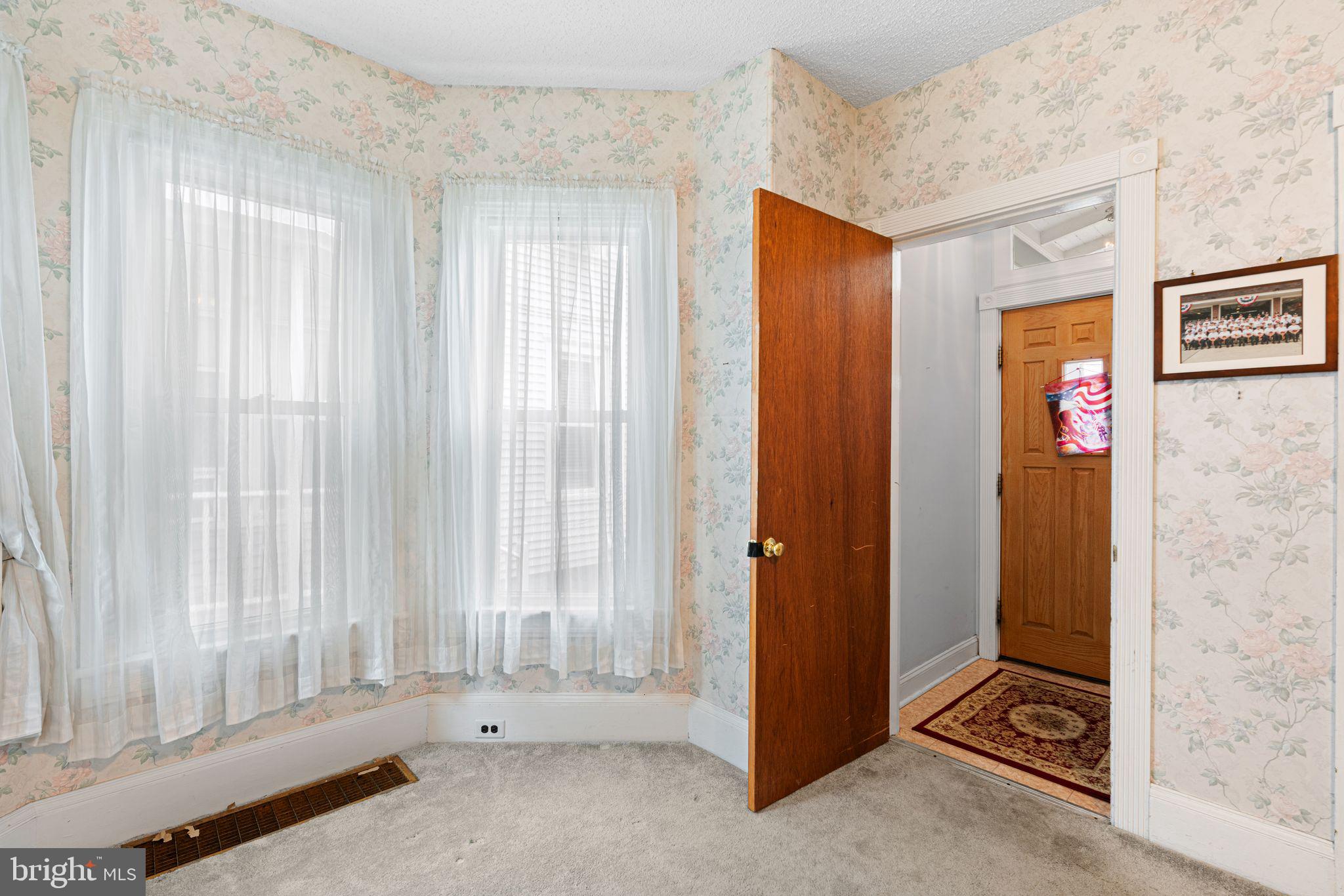 122 West Cottage Avenue Haddonfield, NJ 08033 - Photo 6 of 23 a view of an empty room with a window