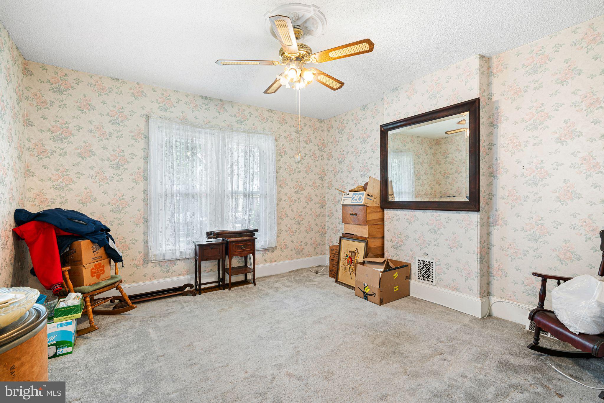 122 West Cottage Avenue Haddonfield, NJ 08033 - Photo 8 of 23 a living room with furniture gym equipment and a window