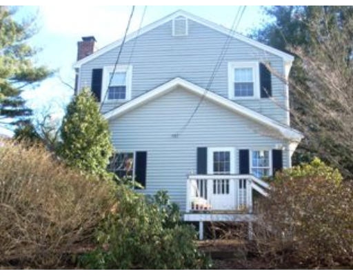 5 Shore Road Natick, MA 01760 - Photo 1 of 1 a front view of a house with a yard and trees