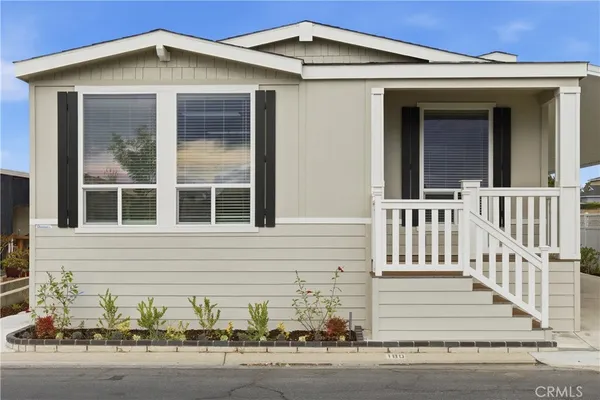 a kitchen with a sink stove and refrigerator