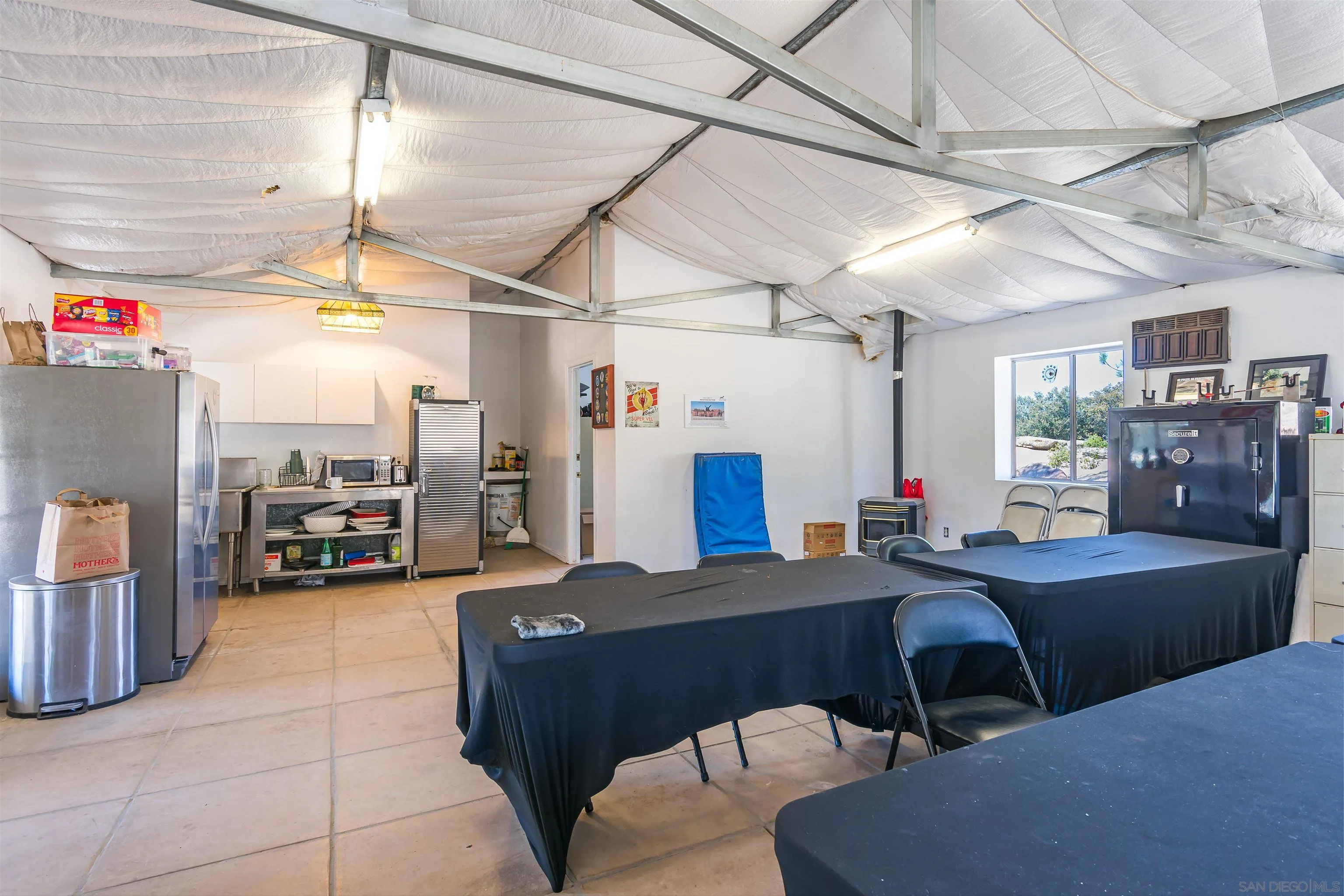 19150 High Glen Road Alpine, CA 91901 - Photo 48 of 56 a view of a livingroom with furniture and a window
