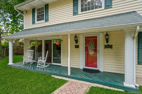 a view of a chair and table of the house
