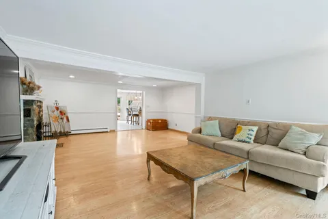 a living room with furniture and a table
