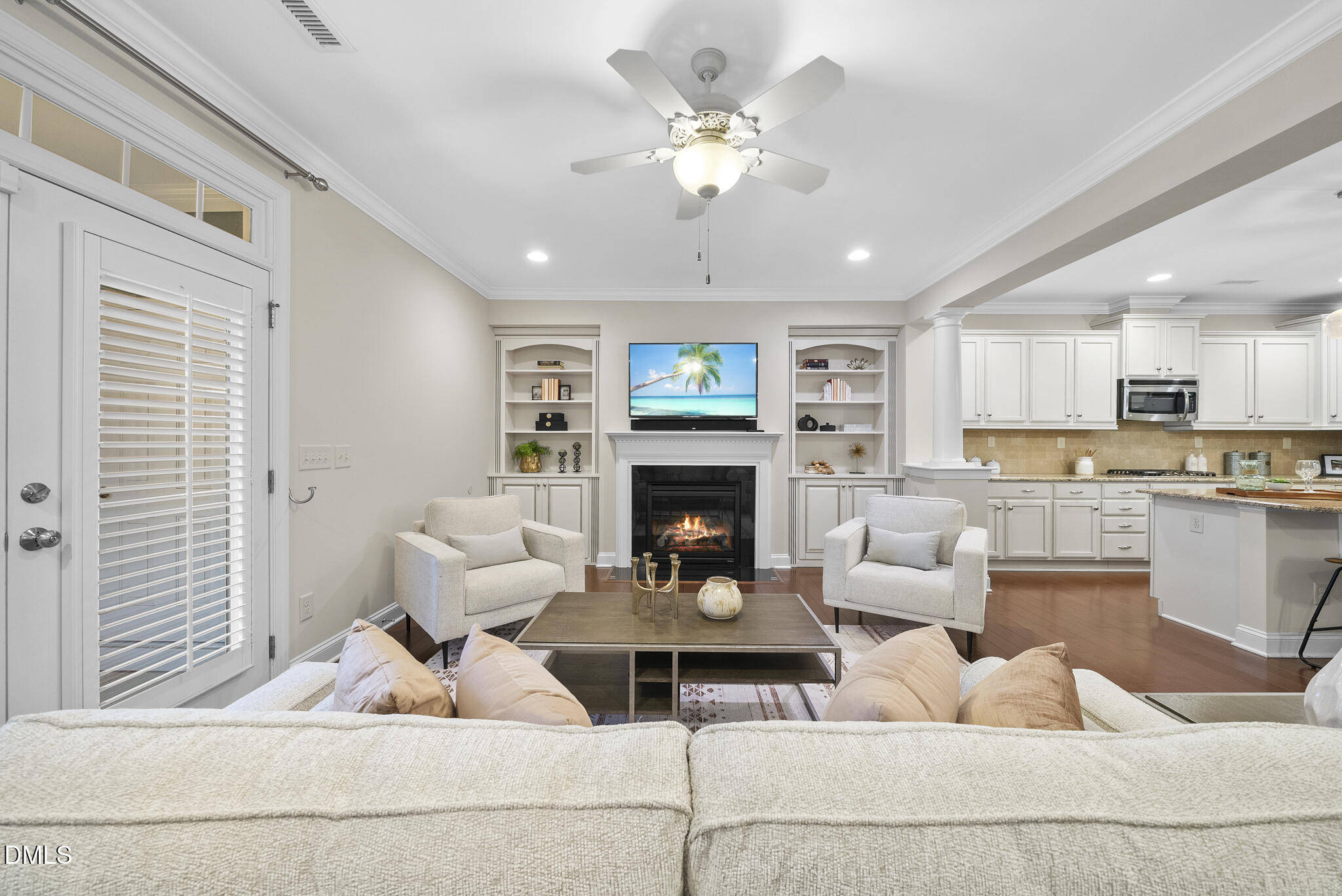 765 Fallon Grove Way Raleigh, NC 27608 - Photo 18 of 43 a living room with furniture and a fireplace