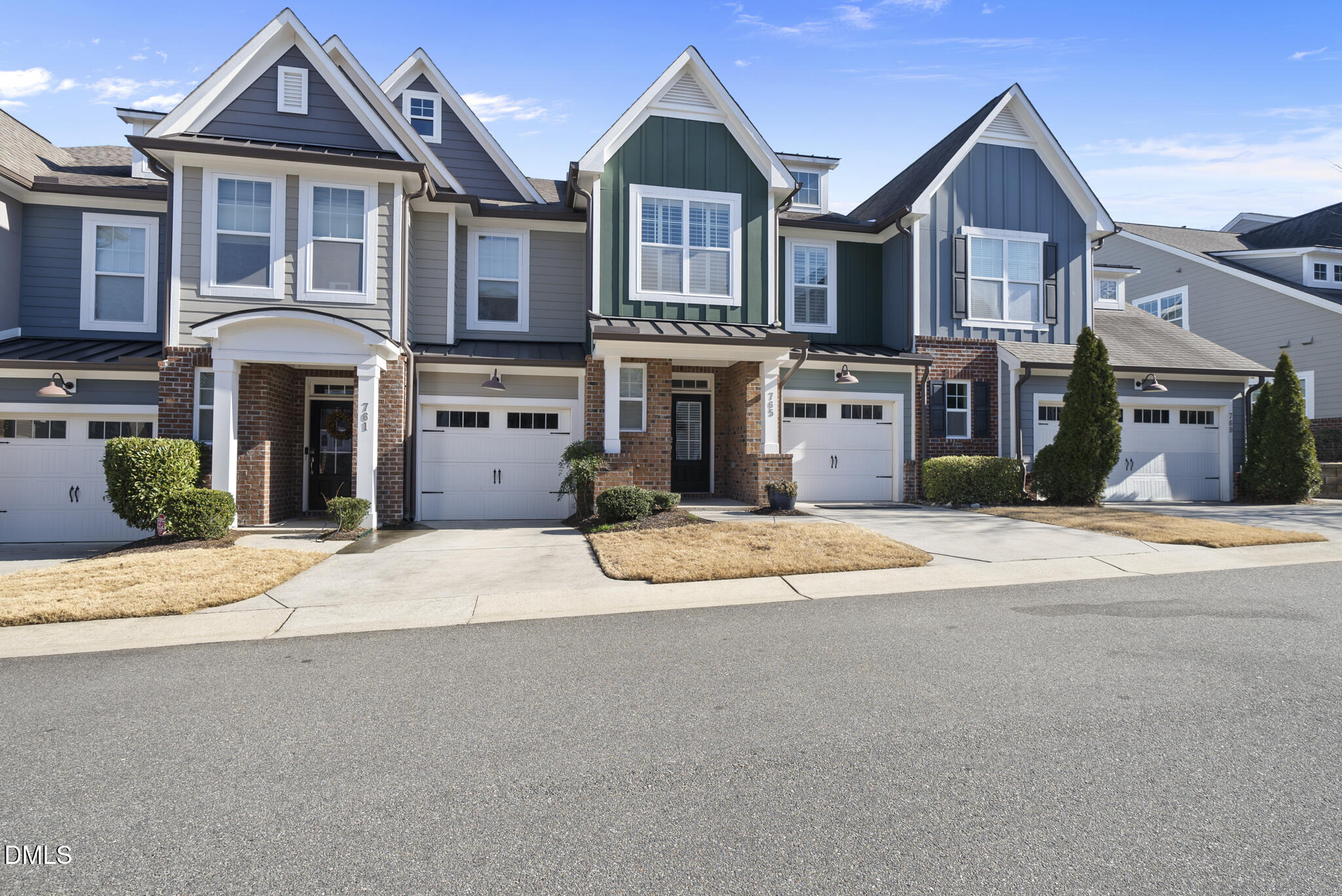 765 Fallon Grove Way Raleigh, NC 27608 - Photo 2 of 43 a front view of a house with a yard