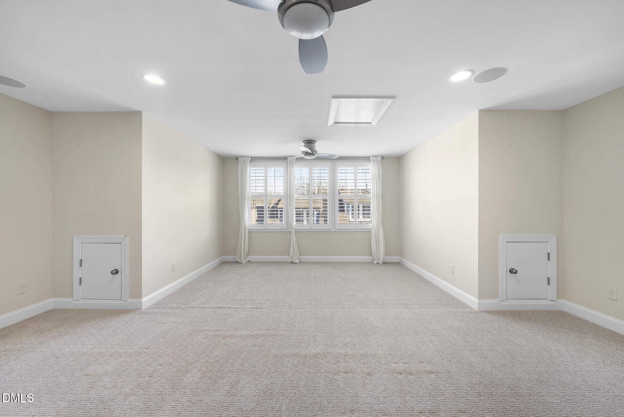 765 Fallon Grove Way Raleigh, NC 27608 - Photo 32 of 43 wooden floor in an empty room with a window