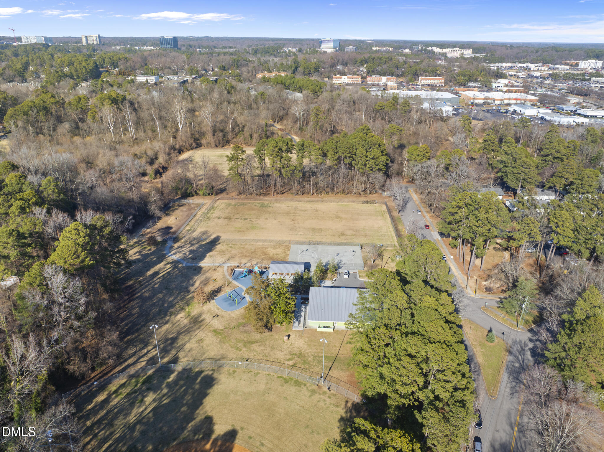 765 Fallon Grove Way Raleigh, NC 27608 - Photo 37 of 43 an aerial view of a houses with a yard