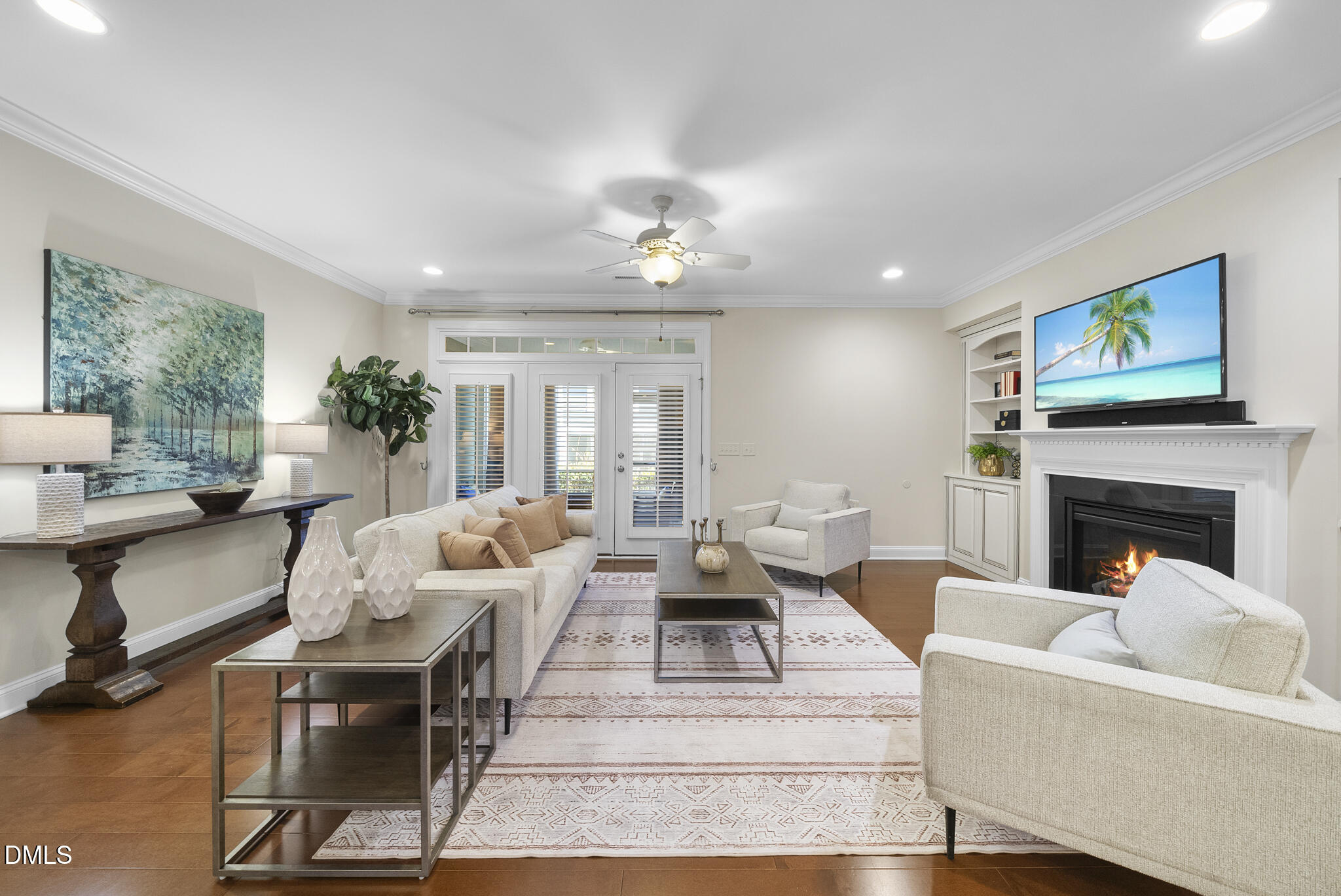 765 Fallon Grove Way Raleigh, NC 27608 - Photo 4 of 43 a living room with furniture a large window and a fireplace