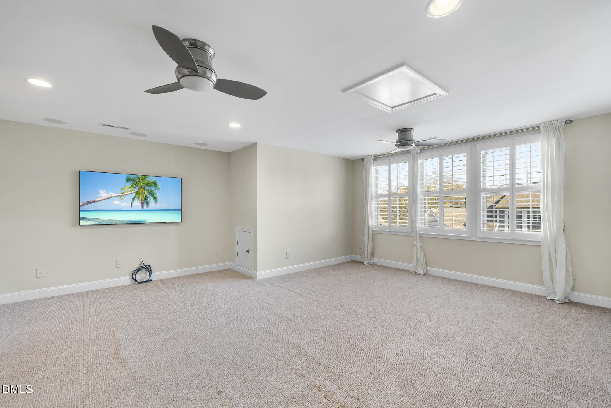 765 Fallon Grove Way Raleigh, NC 27608 - Photo 9 of 43 a view of an empty room with a window