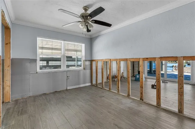 a view of an empty room with a window