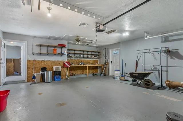 a swimming pool with outdoor seating