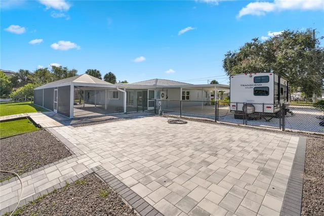 a view of livingroom with furniture and floor to ceiling window