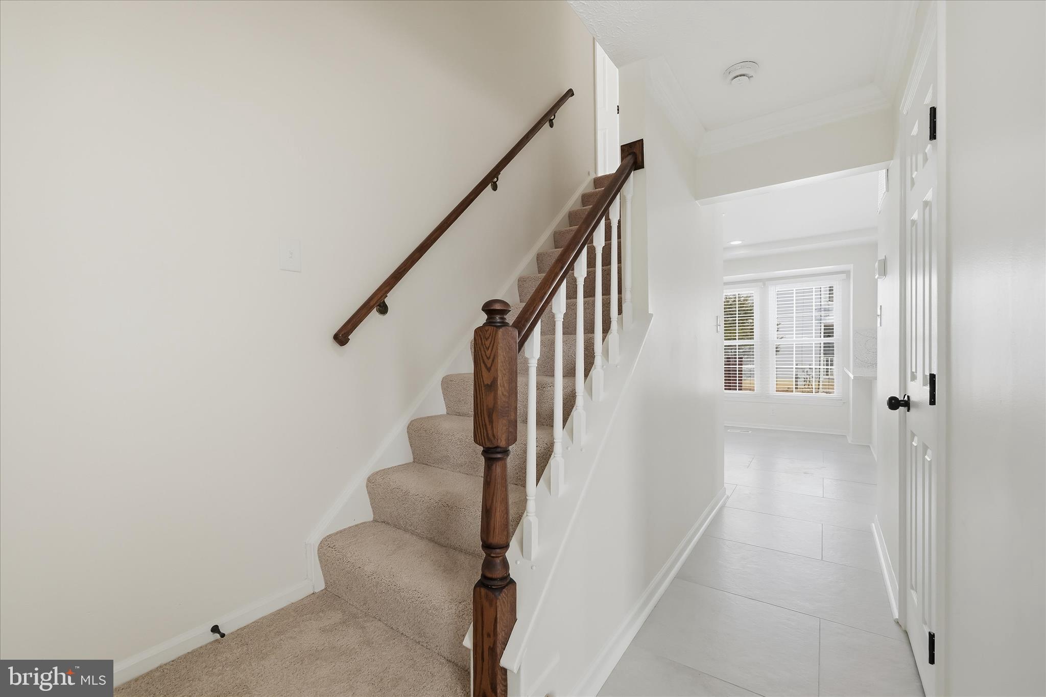 9500 Windbeat Way Columbia, MD 21046 - Photo 21 of 64 Entry way and staircase to upper level