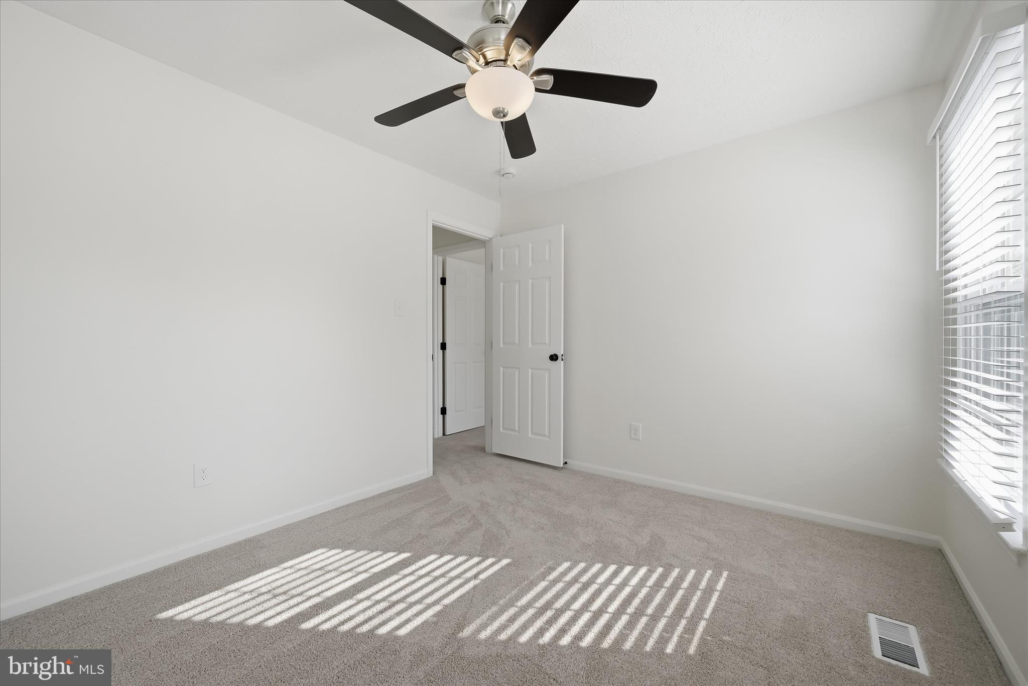 9500 Windbeat Way Columbia, MD 21046 - Photo 37 of 64 Bright third bedroom with ceiling fan