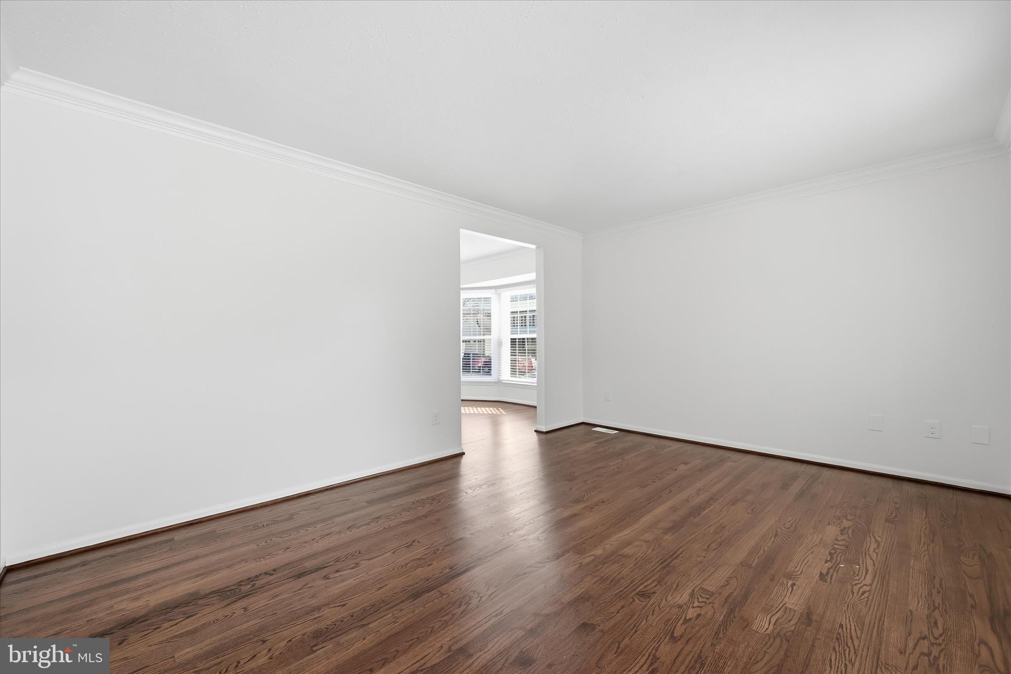 9500 Windbeat Way Columbia, MD 21046 - Photo 8 of 64 Newly refinished hardwood floors in living room