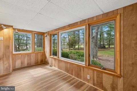 a view of a room with a large window