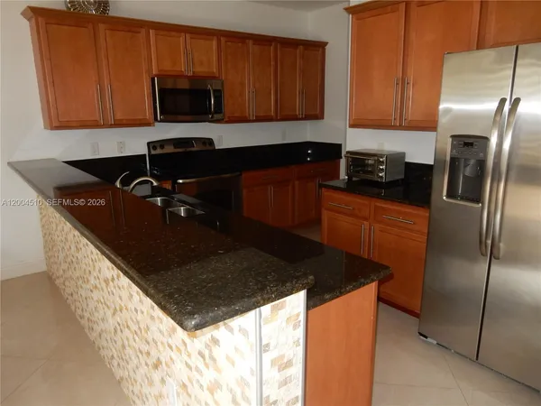 $920,000 | 11455 Northwest 88th Lane, Doral, FL 33178