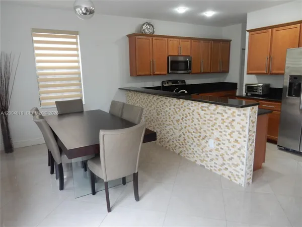 $920,000 | 11455 Northwest 88th Lane, Doral, FL 33178