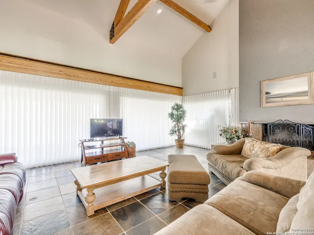 a view of a golf course with a lake