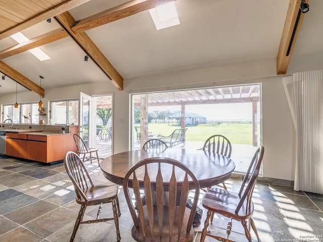 a bathroom with a granite countertop sink vanity granite and a mirror