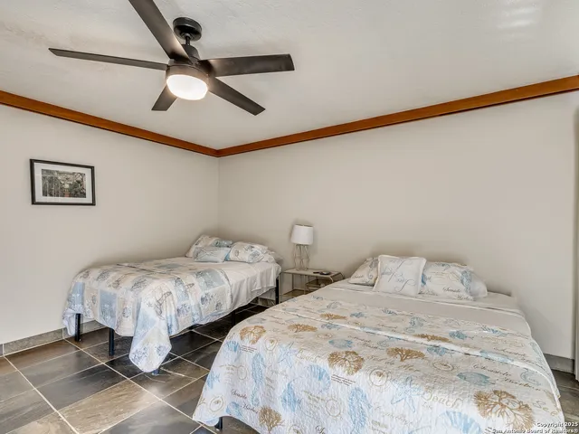 a view of a house with a yard and garage