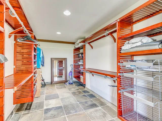 a view of a swimming pool with a yard