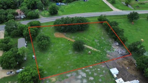 a view of a back yard of a house