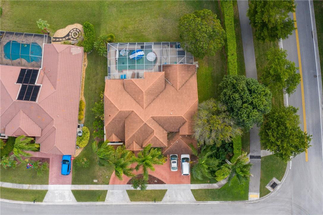 22372 Collington Drive Boca Raton, FL 33428 - Photo 11 of 22 an aerial view of a house with a yard and garden