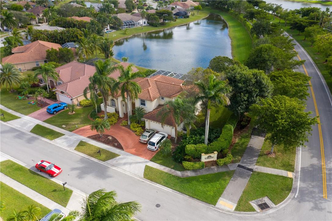 22372 Collington Drive Boca Raton, FL 33428 - Photo 10 of 22 an aerial view of house with yard swimming pool and outdoor seating