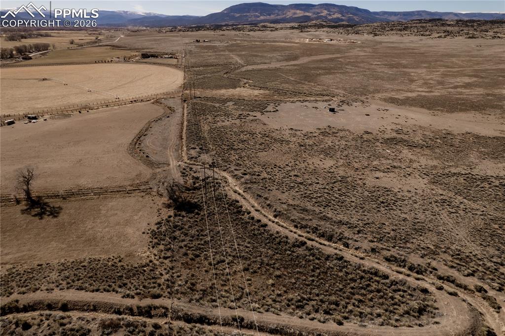 0 County Road 15 Road Del Norte, CO 81132 - Photo 12 of 16 Overview of rural landscape featuring a desert landscape and a mountainous background