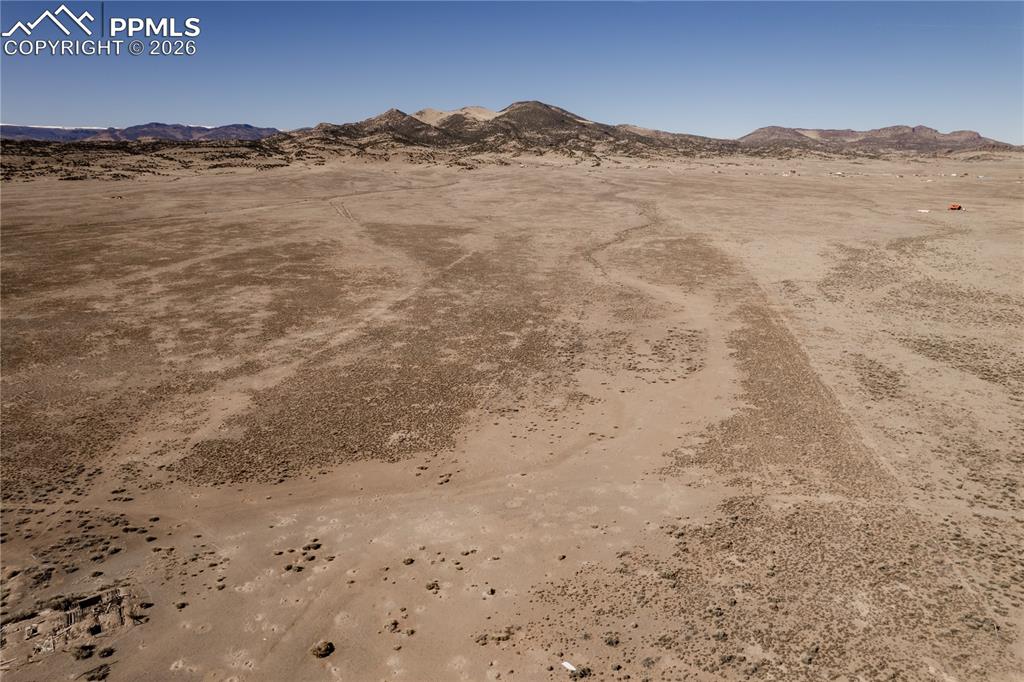 0 County Road 15 Road Del Norte, CO 81132 - Photo 14 of 16 View of mountain background with a desert landscape and rural landscape
