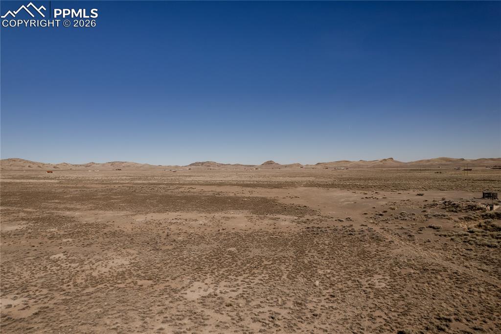 0 County Road 15 Road Del Norte, CO 81132 - Photo 2 of 16 View of nature with a mountain backdrop and a desert landscape