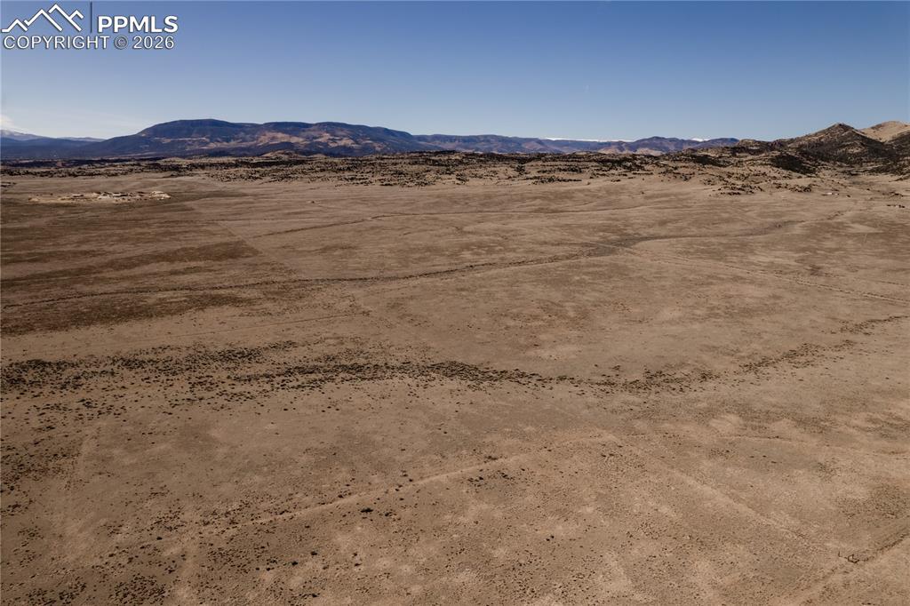 0 County Road 15 Road Del Norte, CO 81132 - Photo 8 of 16 View of mountain background featuring a desert landscape and rural landscape