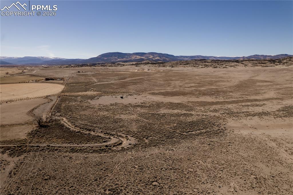 0 County Road 15 Road Del Norte, CO 81132 - Photo 9 of 16 View of mountain background with rural landscape and a desert landscape