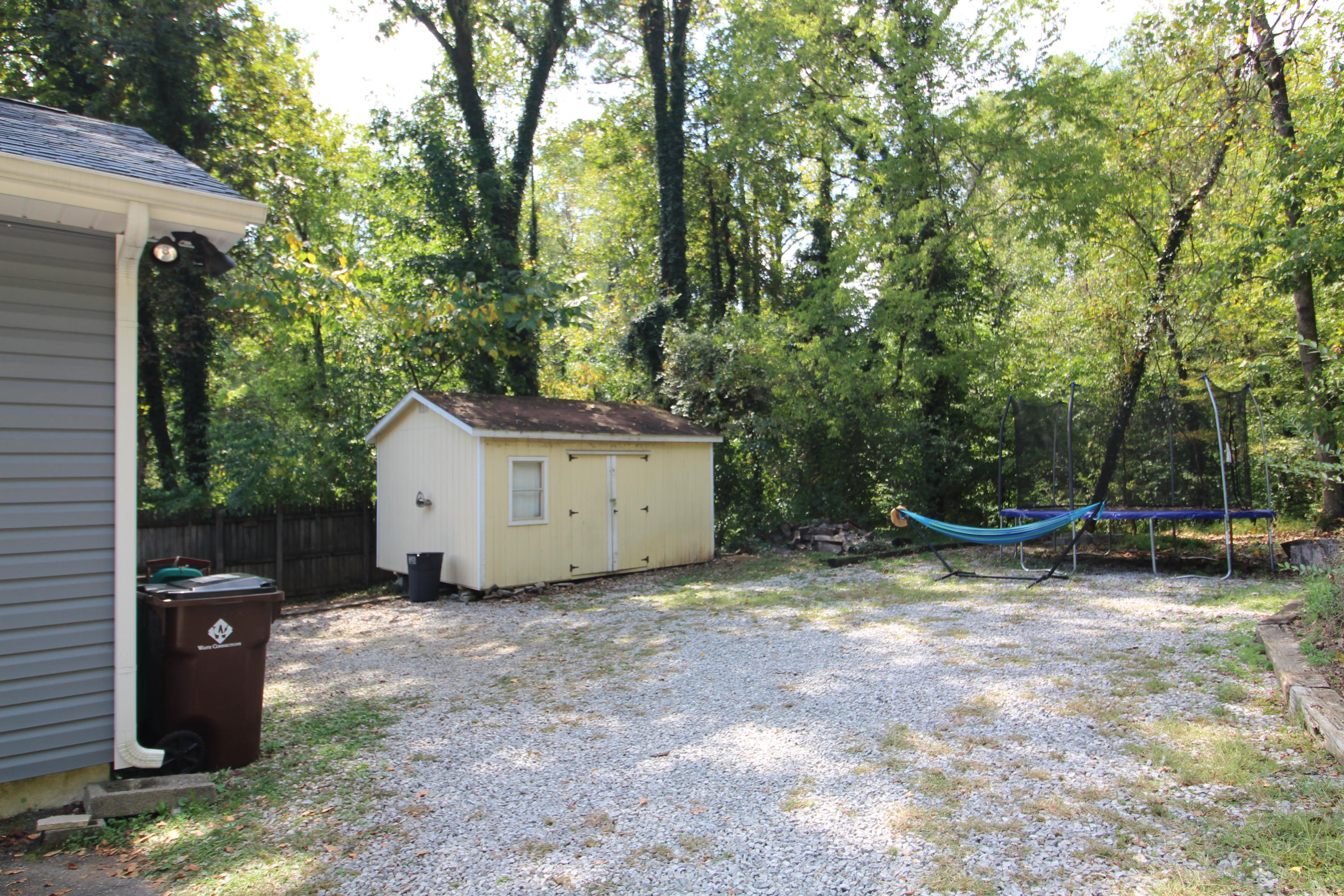 319 West Faunce Road Oak Ridge, TN 37830 - Photo 7 of 32 Driveway and shed