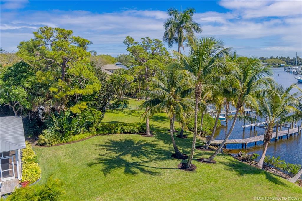 3404 Southeast Inlet Harbor Trail Stuart, FL 34996 - Photo 29 of 32 a view of a garden with a house