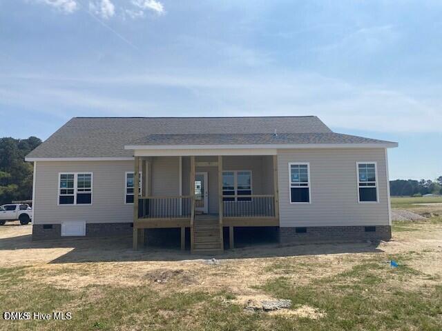 7712 New Sandy Hill Sims, NC 27880 - Photo 2 of 2 a view of a house with a yard