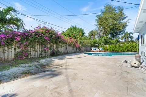a front view of a house with a yard and a garage