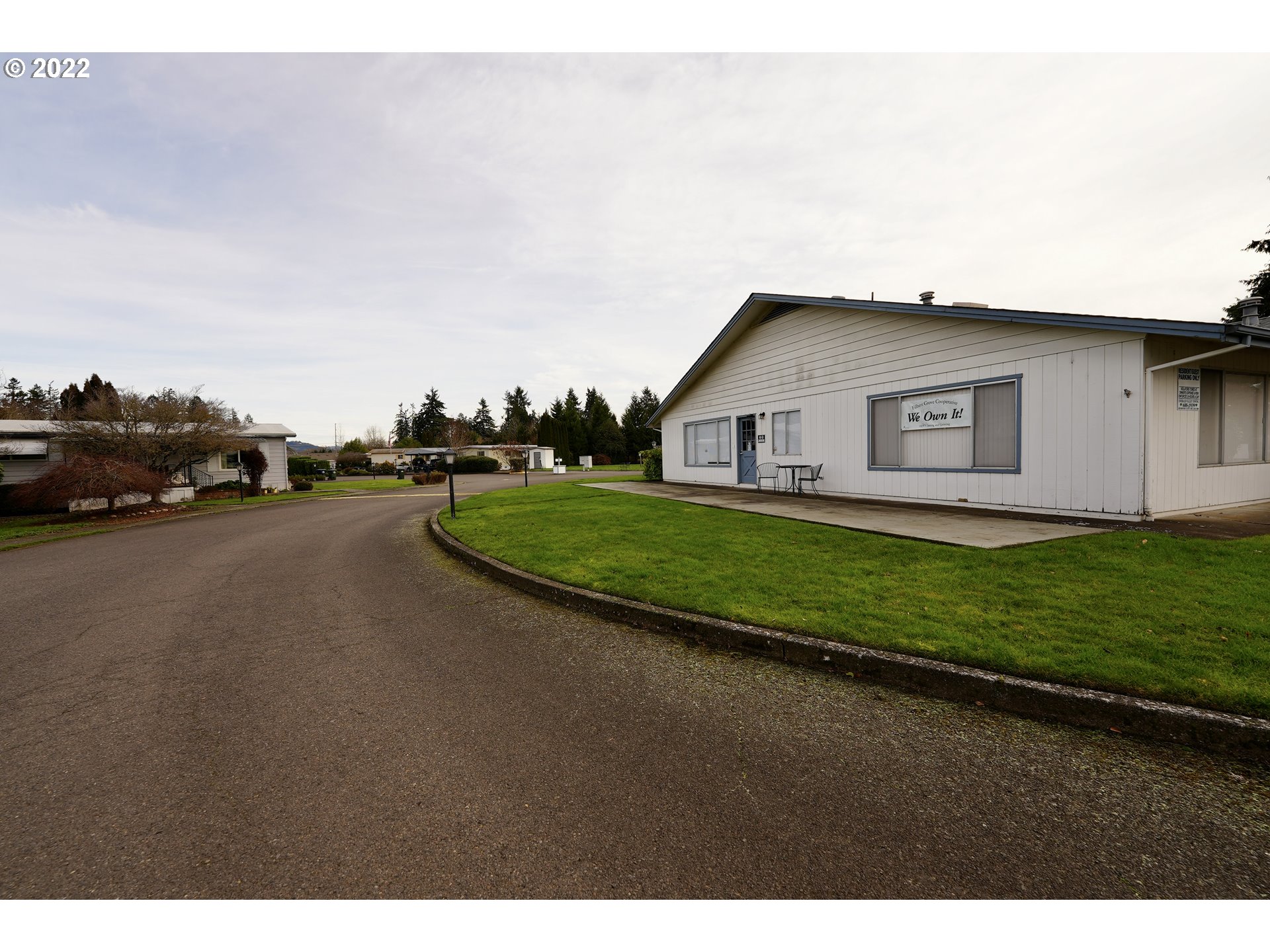 3530 Game Farm Road, Unit 11 Springfield, OR 97477 - Photo 20 of 27 a view of a house with a yard and garage