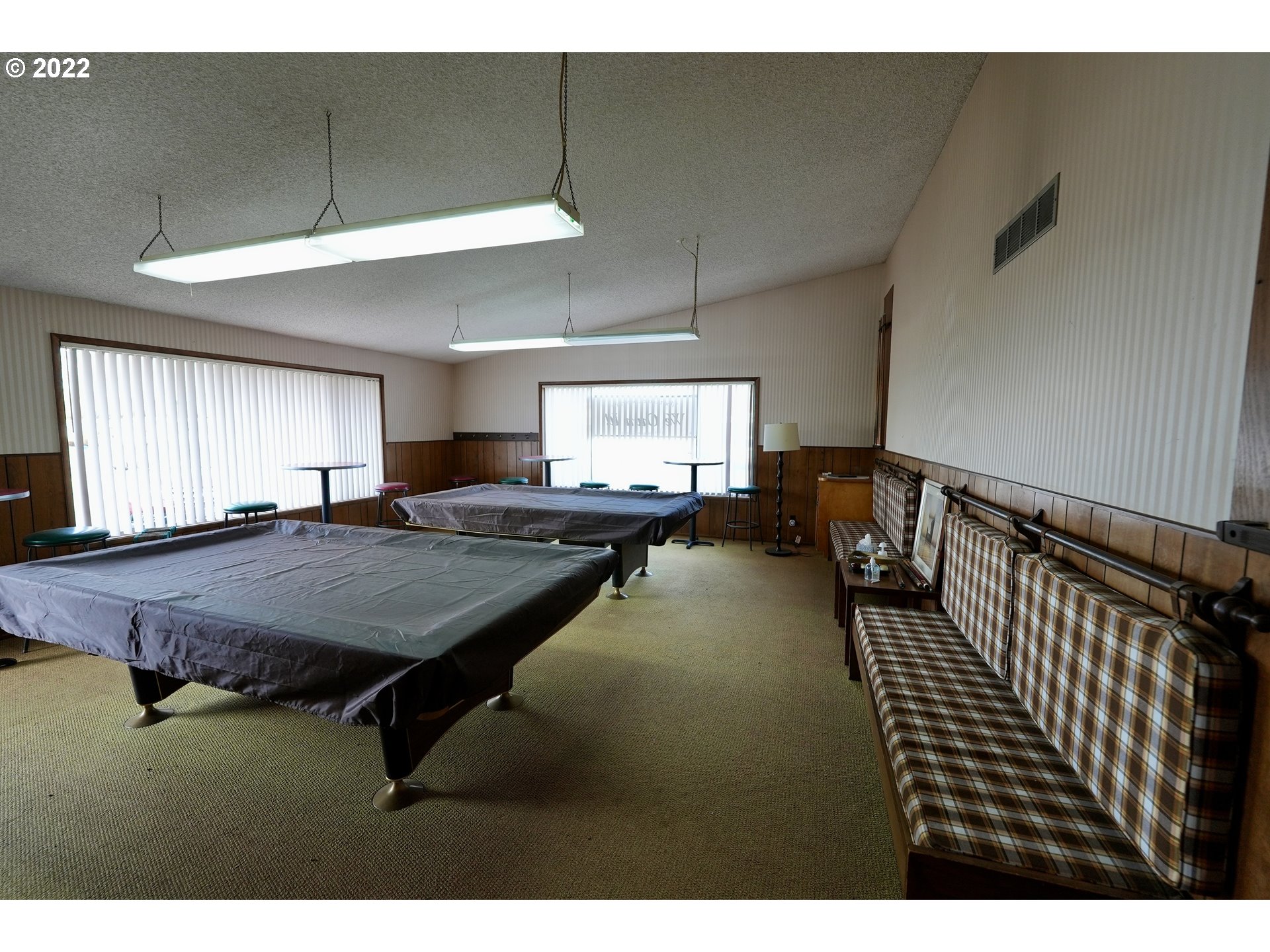 3530 Game Farm Road, Unit 11 Springfield, OR 97477 - Photo 21 of 27 a dining room with furniture and a wooden floor