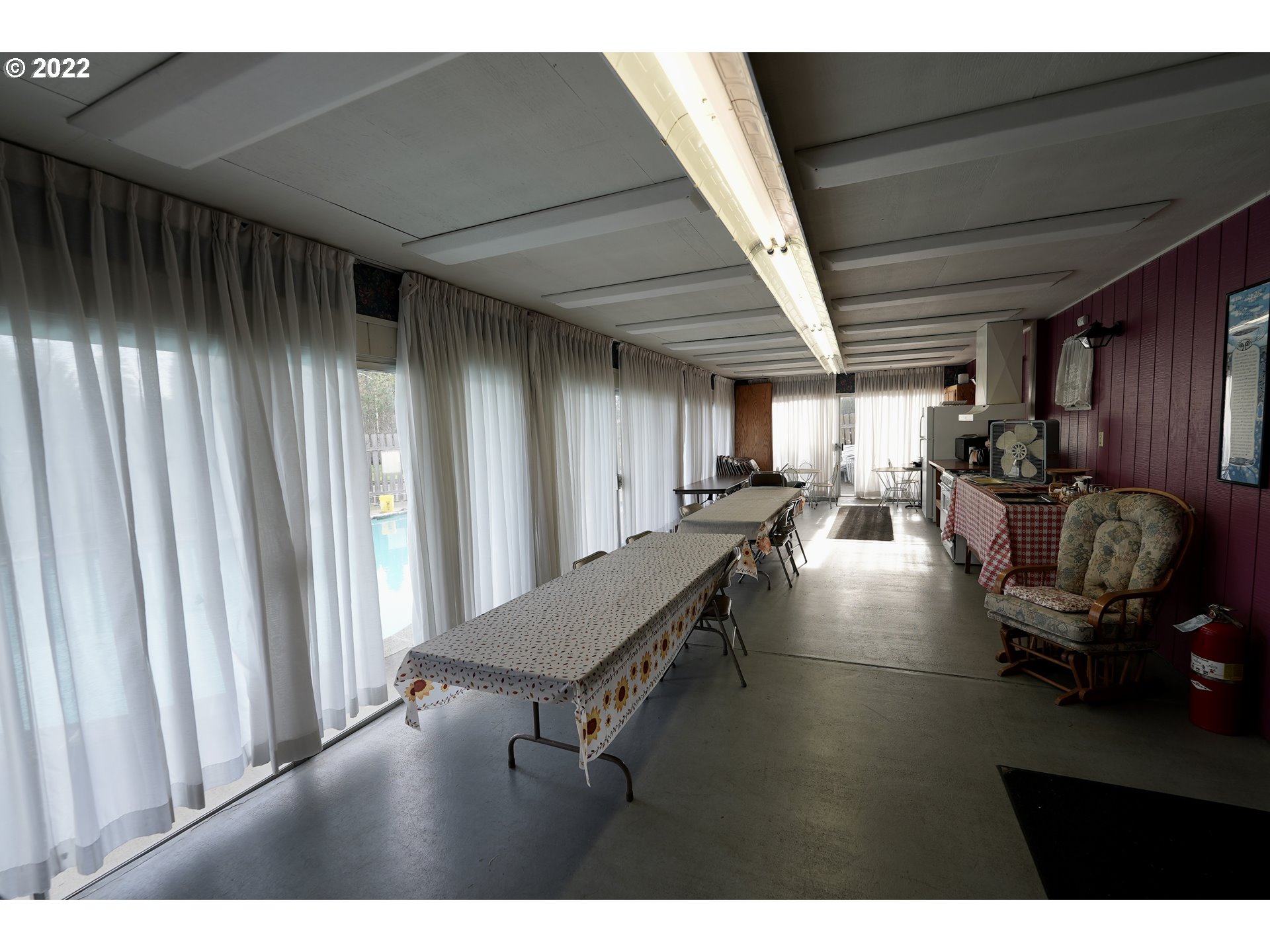 3530 Game Farm Road, Unit 11 Springfield, OR 97477 - Photo 24 of 27 a living room with furniture and a large window
