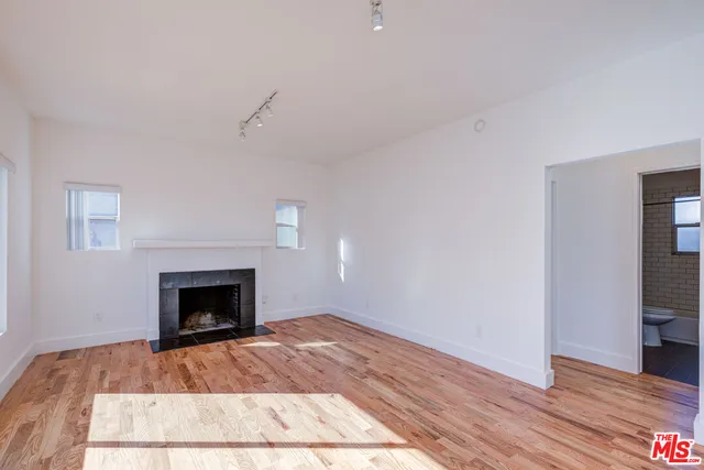 a living room with a fireplace